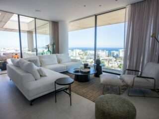Eden-Residences-Living-room-with-sea-view-daytime-1